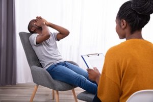 male patient undergoes behavioral therapy program