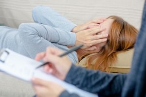 female patient works in therapy at crack addiction treatment center in california