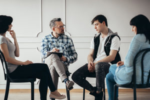 This group of people are attending group therapy at a California rehabilitation center.